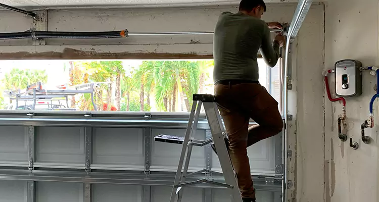 Garage Door Tension Spring Replacement in University, FL